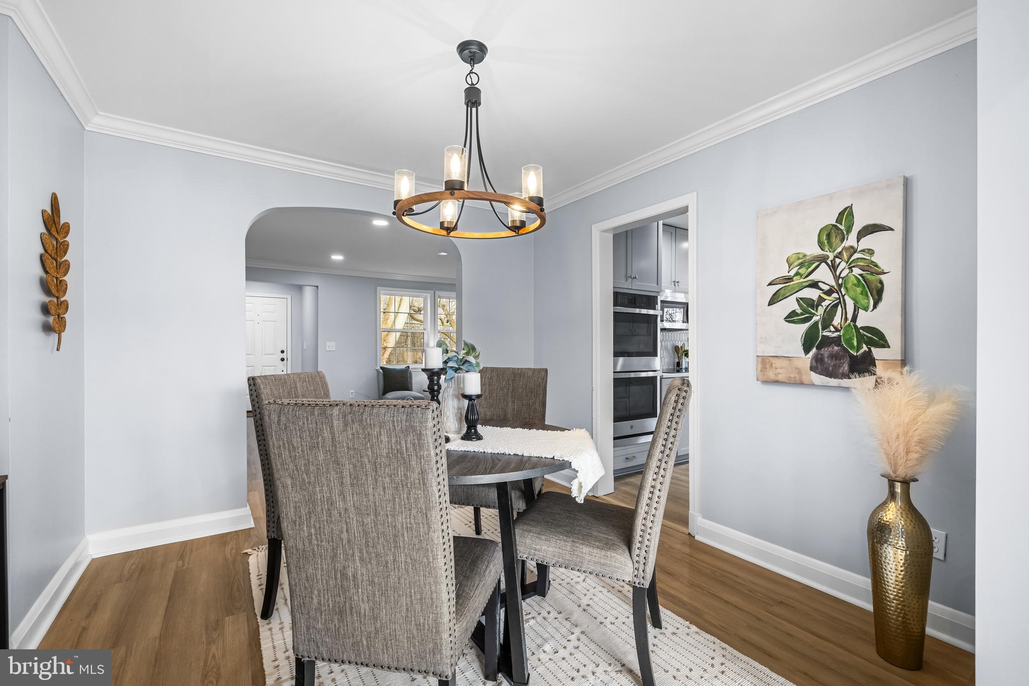 3533 Stansbury Mill Road Phoenix, MD 21131 - Photo 23 of 47 a view of a dining room with furniture and wooden floor