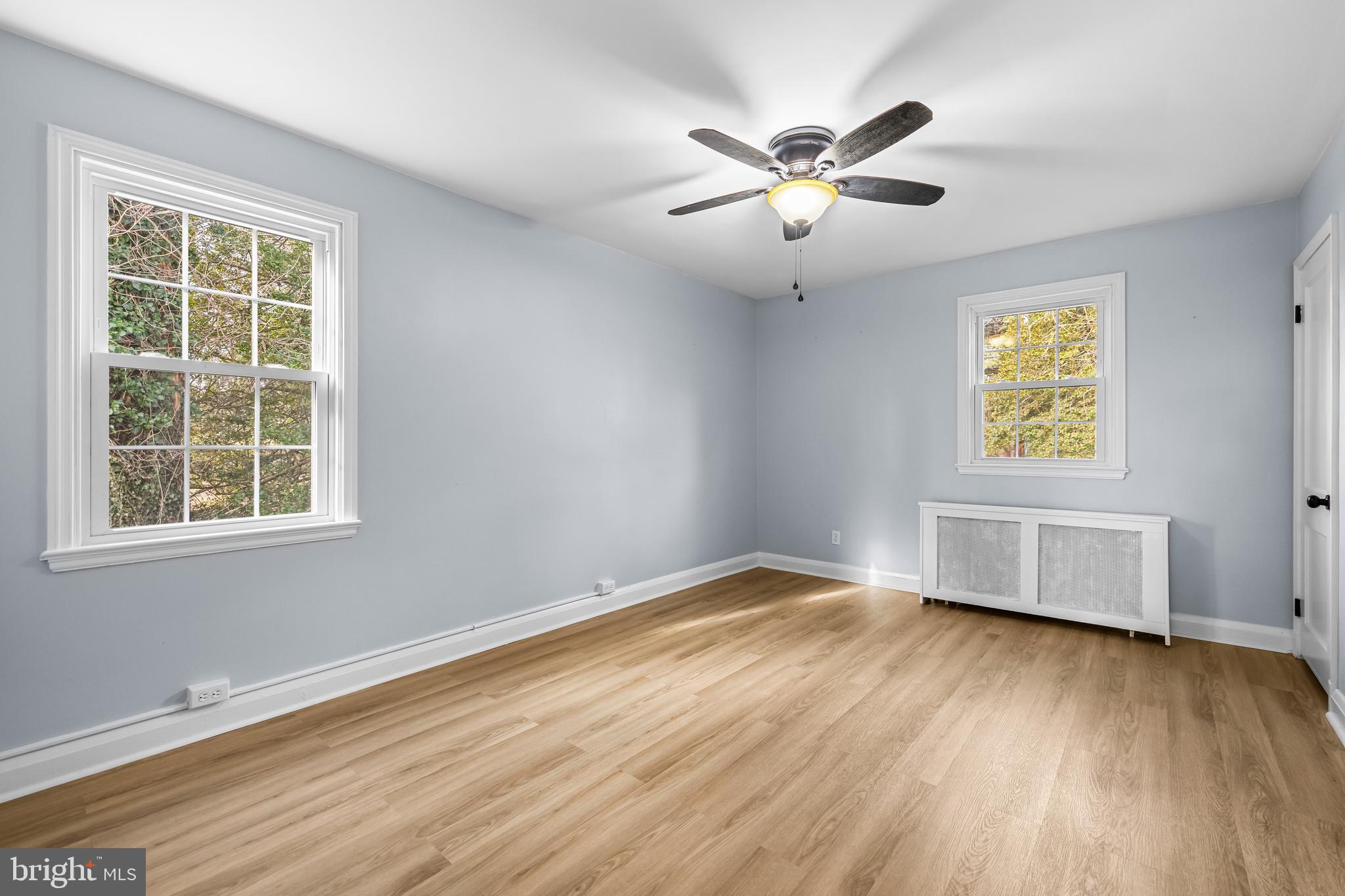 3533 Stansbury Mill Road Phoenix, MD 21131 - Photo 25 of 47 a view of an empty room with wooden floor and a window