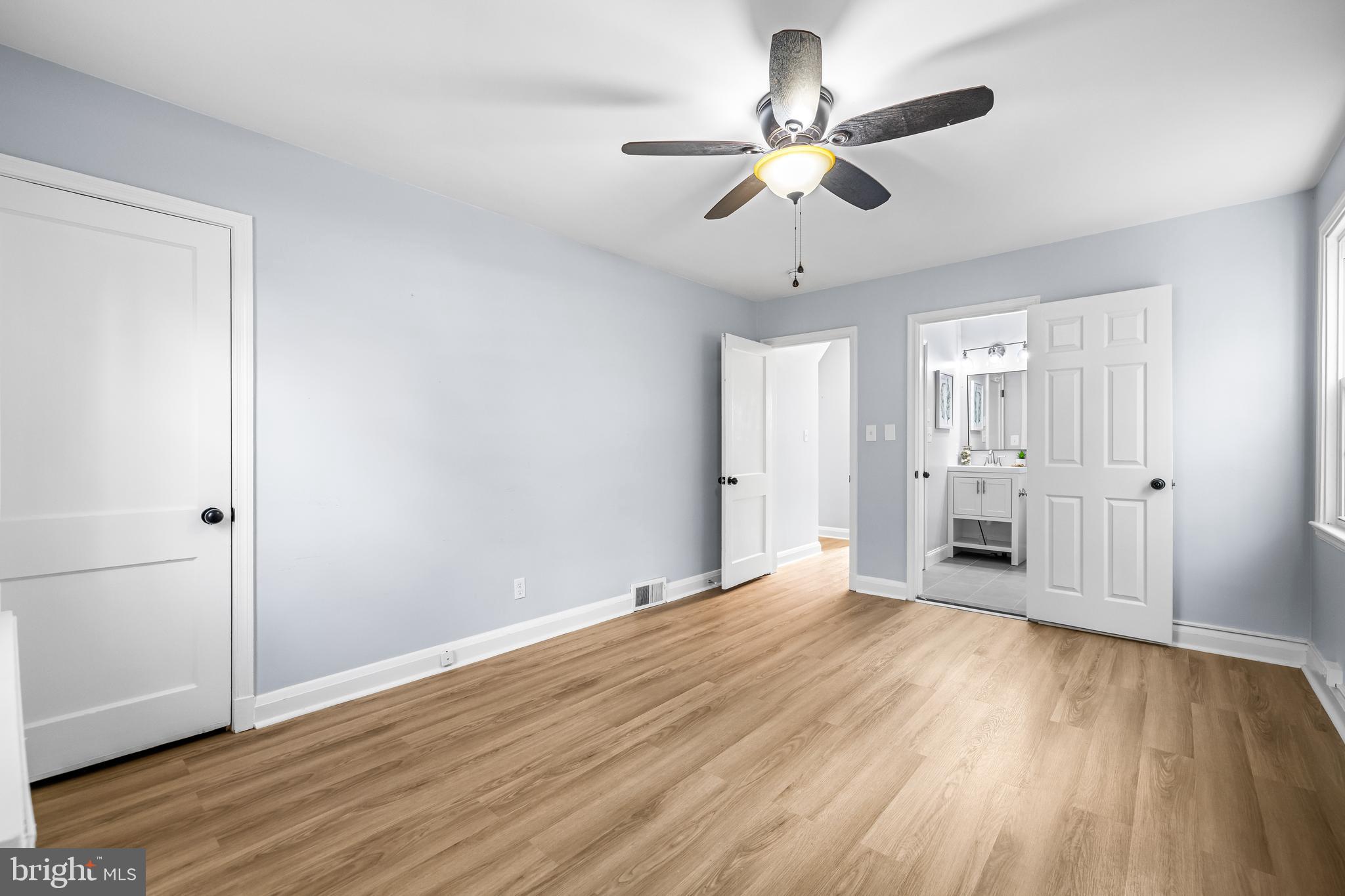 3533 Stansbury Mill Road Phoenix, MD 21131 - Photo 26 of 47 a view of an empty room with wooden floor