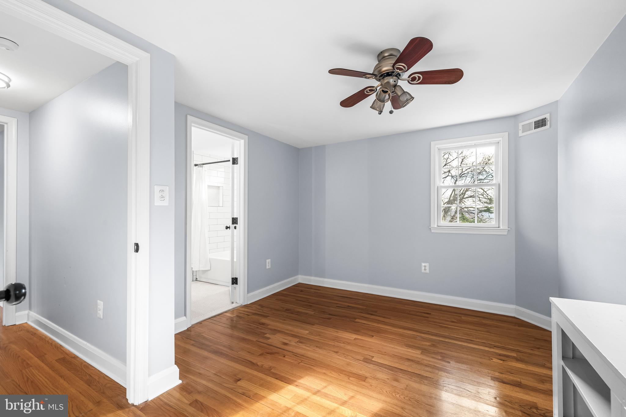 3533 Stansbury Mill Road Phoenix, MD 21131 - Photo 34 of 47 a view of a workspace with wooden floor and windows