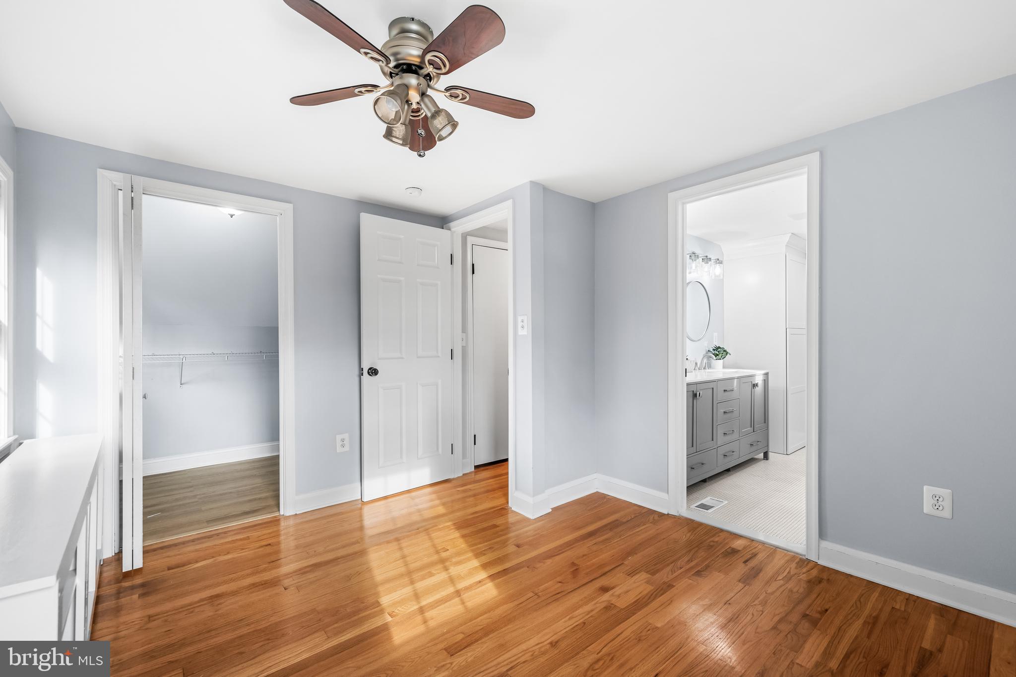 3533 Stansbury Mill Road Phoenix, MD 21131 - Photo 35 of 47 a view of empty room with wooden floor and fan