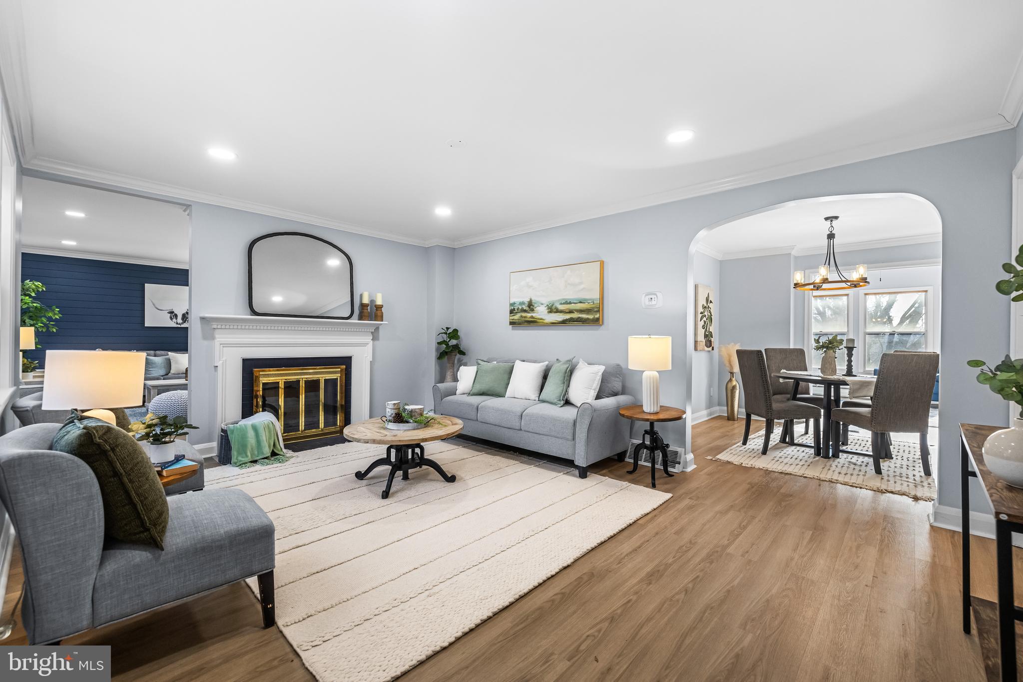 3533 Stansbury Mill Road Phoenix, MD 21131 - Photo 7 of 47 a living room with furniture fireplace and a table