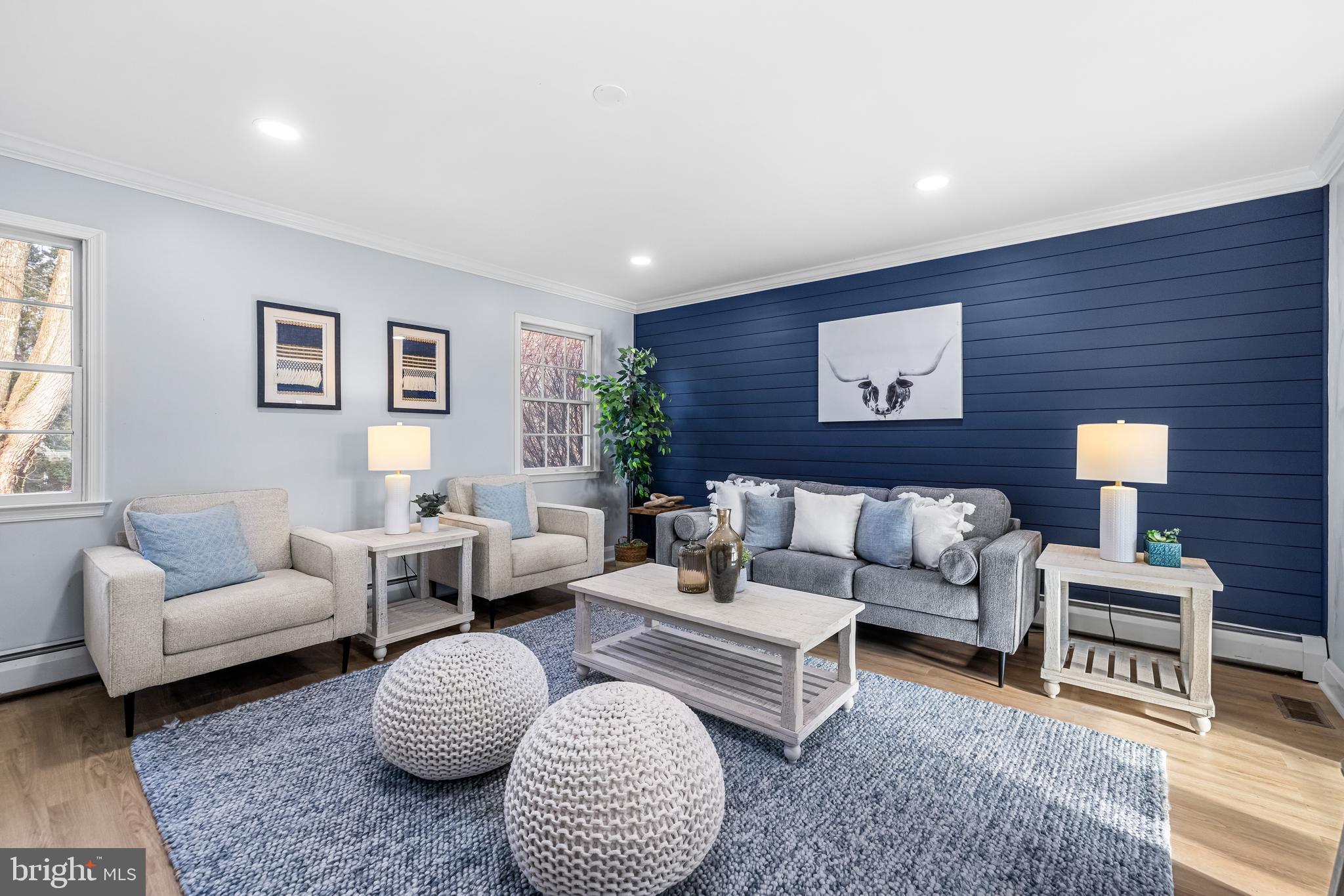 3533 Stansbury Mill Road Phoenix, MD 21131 - Photo 9 of 47 a living room with furniture and a rug