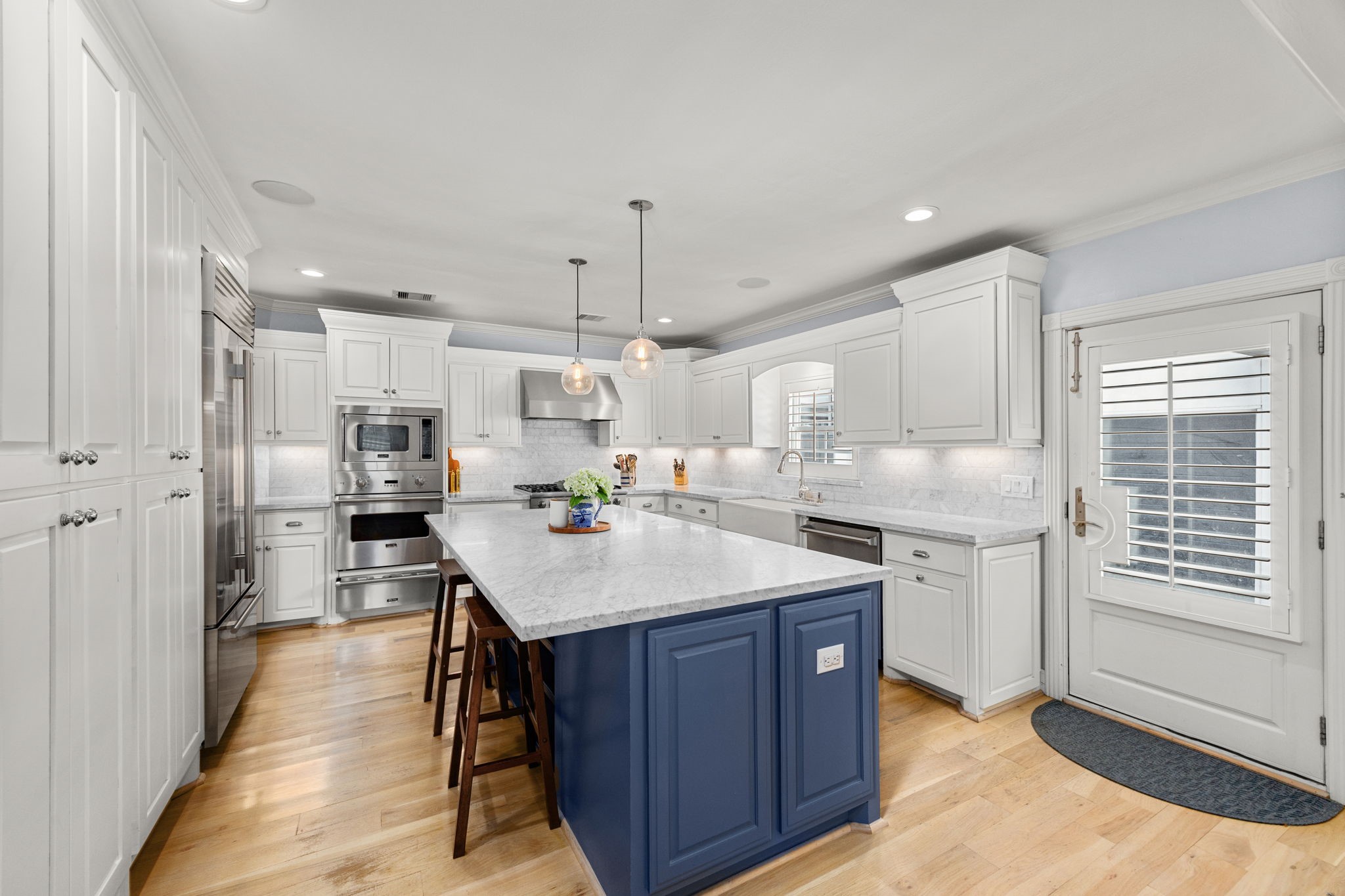 1741 Banks Street Houston, TX 77098 - Photo 13 of 50 Gourmet chef's kitchen with high end appliances, Marble counter tops, Breakfast bar and custom built cabinetry