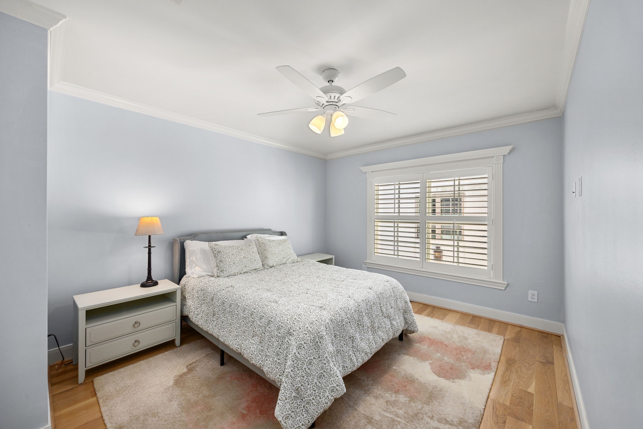 1741 Banks Street Houston, TX 77098 - Photo 27 of 50 a bedroom with a bed and a window