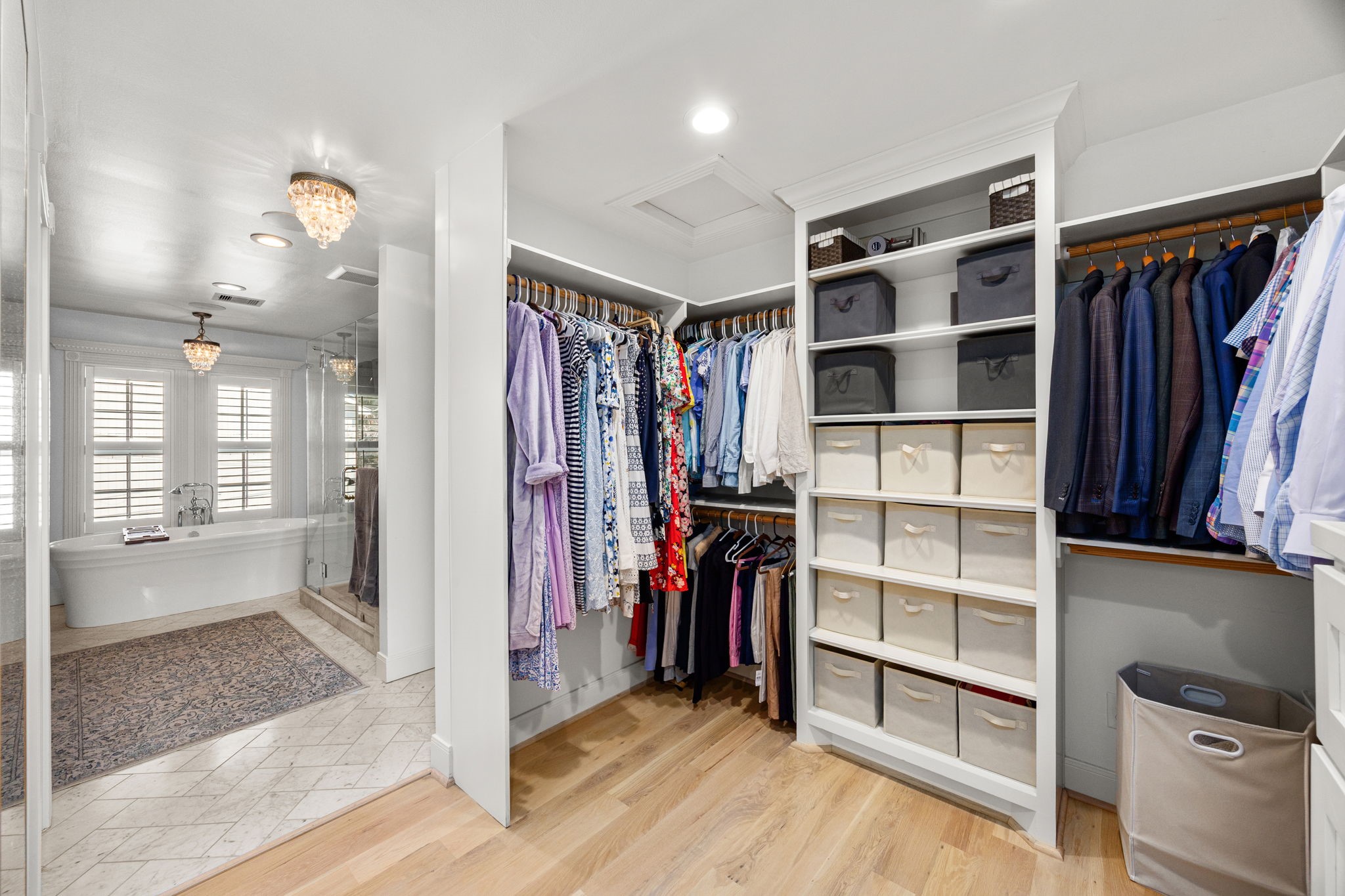 1741 Banks Street Houston, TX 77098 - Photo 38 of 50 a view of walk in closet with clothes and shoes