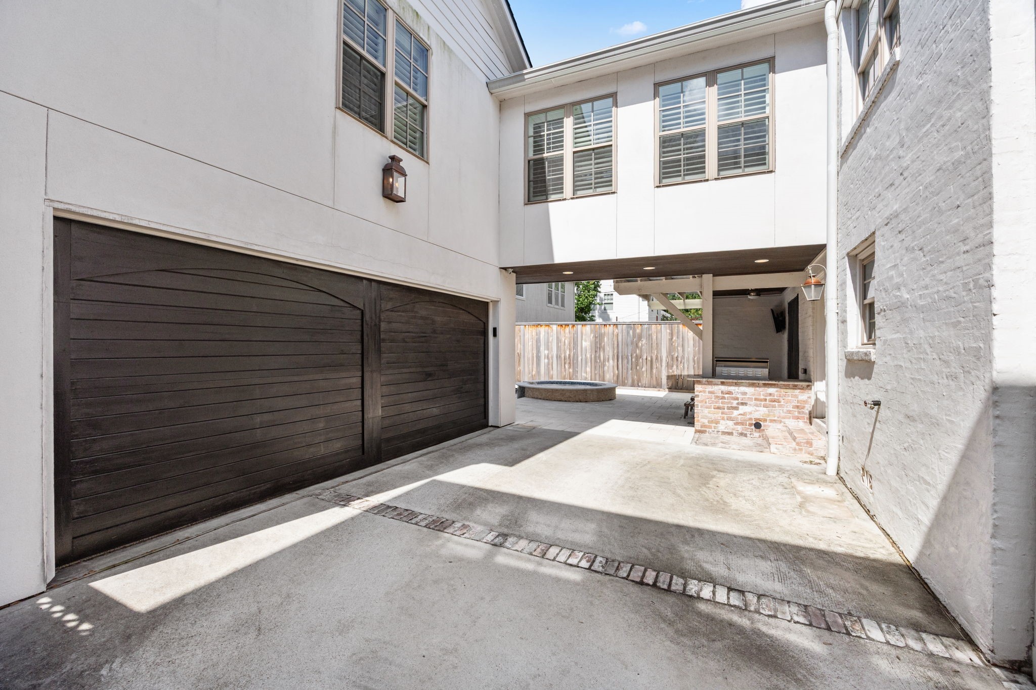 1741 Banks Street Houston, TX 77098 - Photo 44 of 50 a view of a house with a wooden fence
