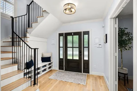 a view of an entryway with livingroom