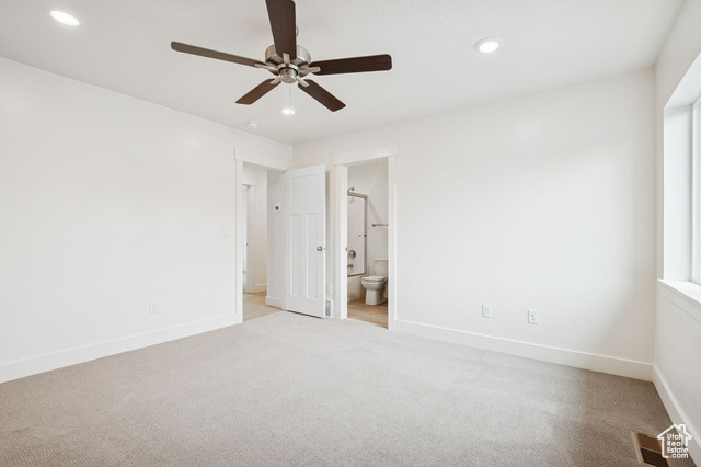 1615 North Angel Street, Unit H Layton, UT 84041 - Photo 29 of 55 Unfurnished bedroom featuring carpet, ceiling fan, recessed lighting, and ensuite bath