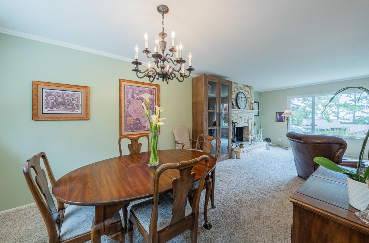 24 Pinehill Way Monterey, CA 93940 - Photo 15 of 51 a view of a dining room with furniture a chandelier and window