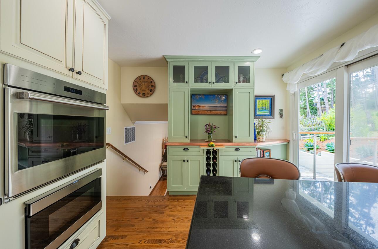 24 Pinehill Way Monterey, CA 93940 - Photo 20 of 51 a kitchen with a stove a sink and a microwave
