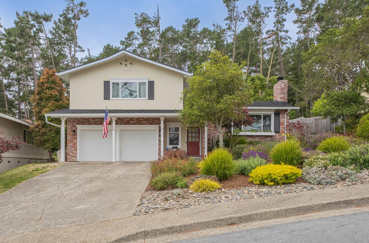24 Pinehill Way Monterey, CA 93940 - Photo 2 of 51 a front view of house with yard and trees around