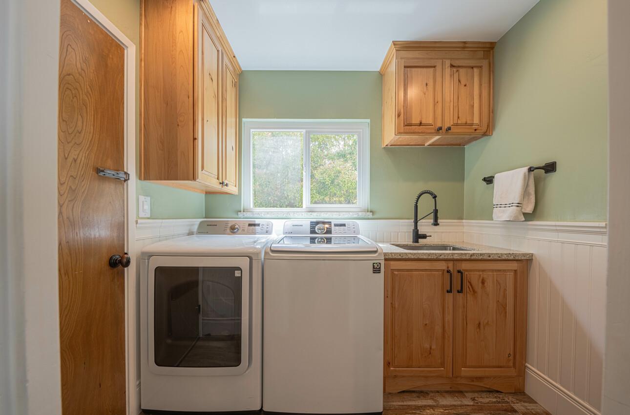 24 Pinehill Way Monterey, CA 93940 - Photo 23 of 51 a kitchen with a sink cabinets and a window