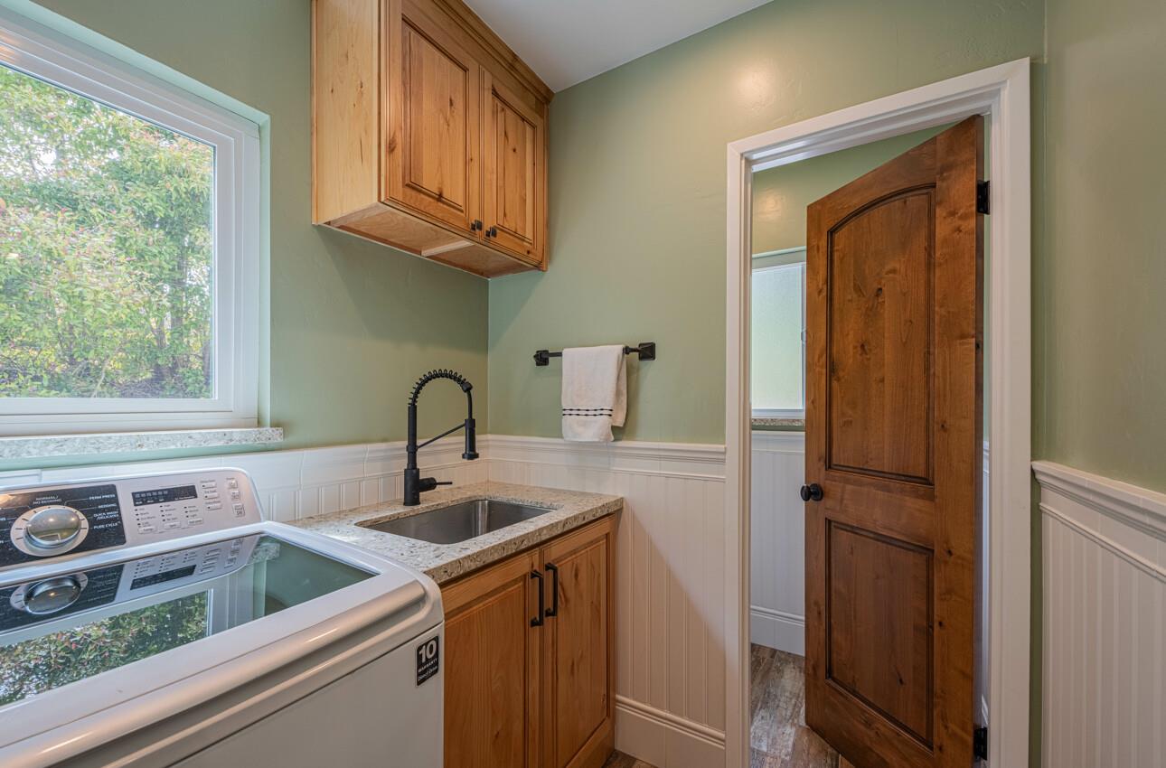 24 Pinehill Way Monterey, CA 93940 - Photo 24 of 51 a kitchen with a sink and a window