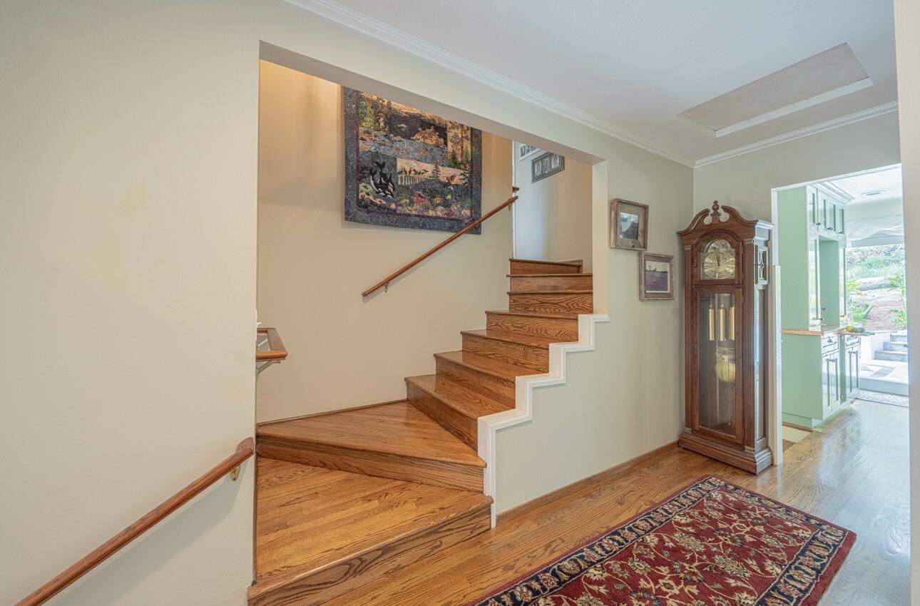 24 Pinehill Way Monterey, CA 93940 - Photo 26 of 51 a view of entryway with stairs and wooden floor
