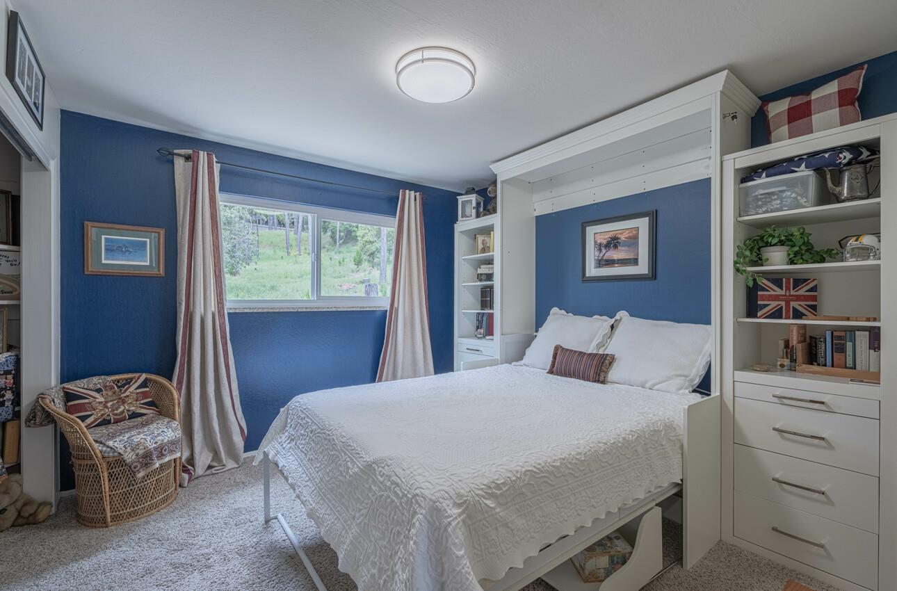 24 Pinehill Way Monterey, CA 93940 - Photo 29 of 51 a bedroom with a bed and a dresser