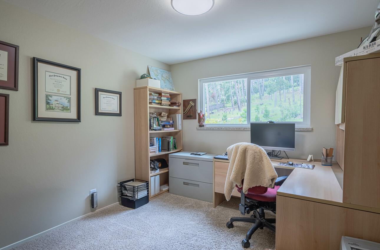 24 Pinehill Way Monterey, CA 93940 - Photo 32 of 51 a view of a workspace with furniture and a window