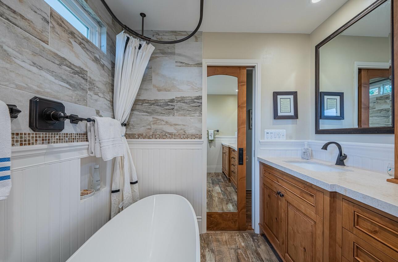 24 Pinehill Way Monterey, CA 93940 - Photo 35 of 51 a bathroom with a toilet a sink and a mirror