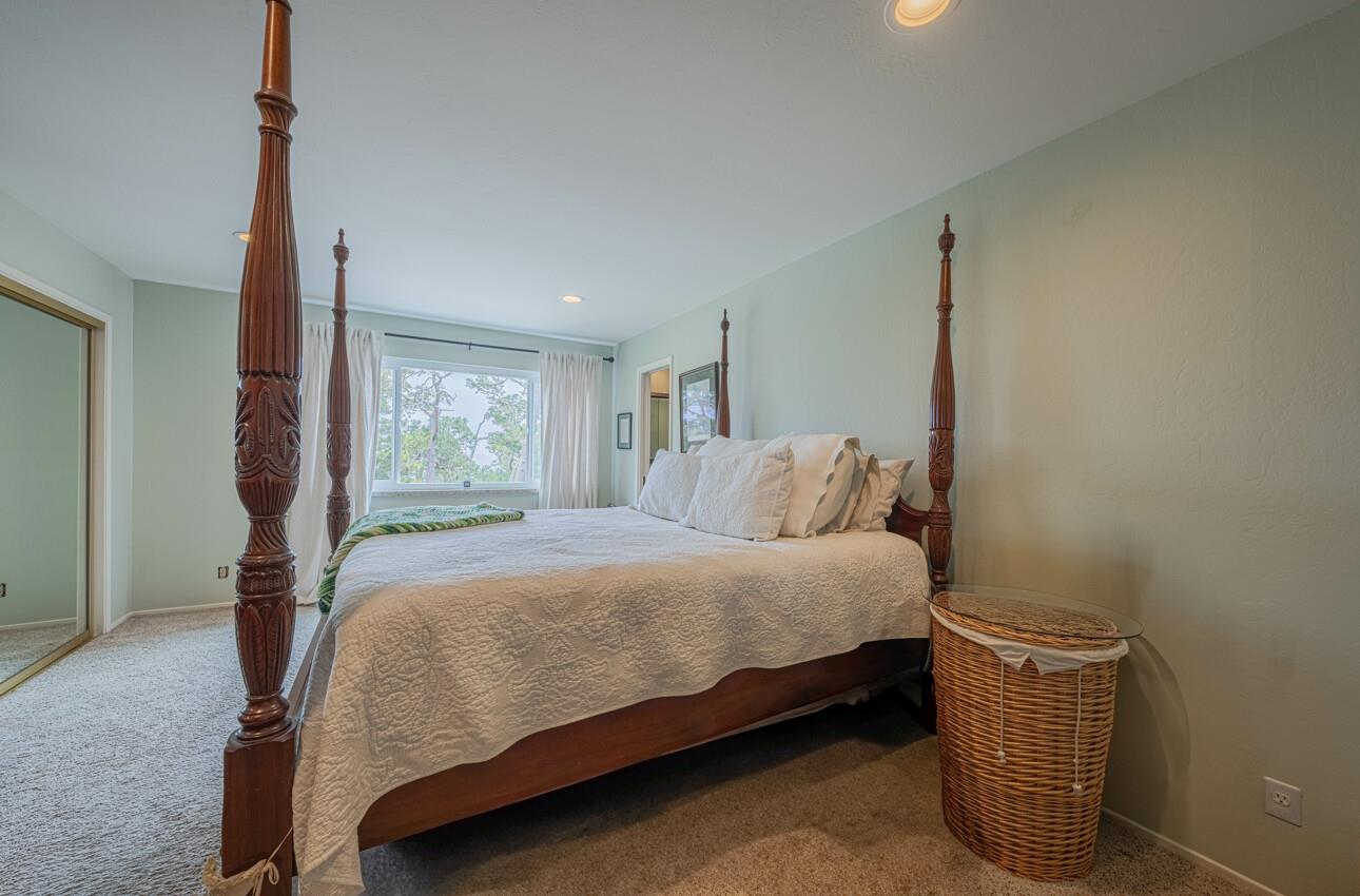 24 Pinehill Way Monterey, CA 93940 - Photo 36 of 51 a bedroom with a bed and window