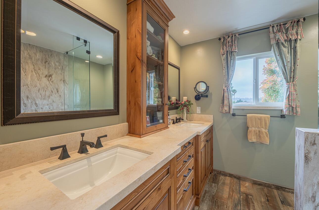 24 Pinehill Way Monterey, CA 93940 - Photo 40 of 51 a bathroom with a double vanity sink mirror and double