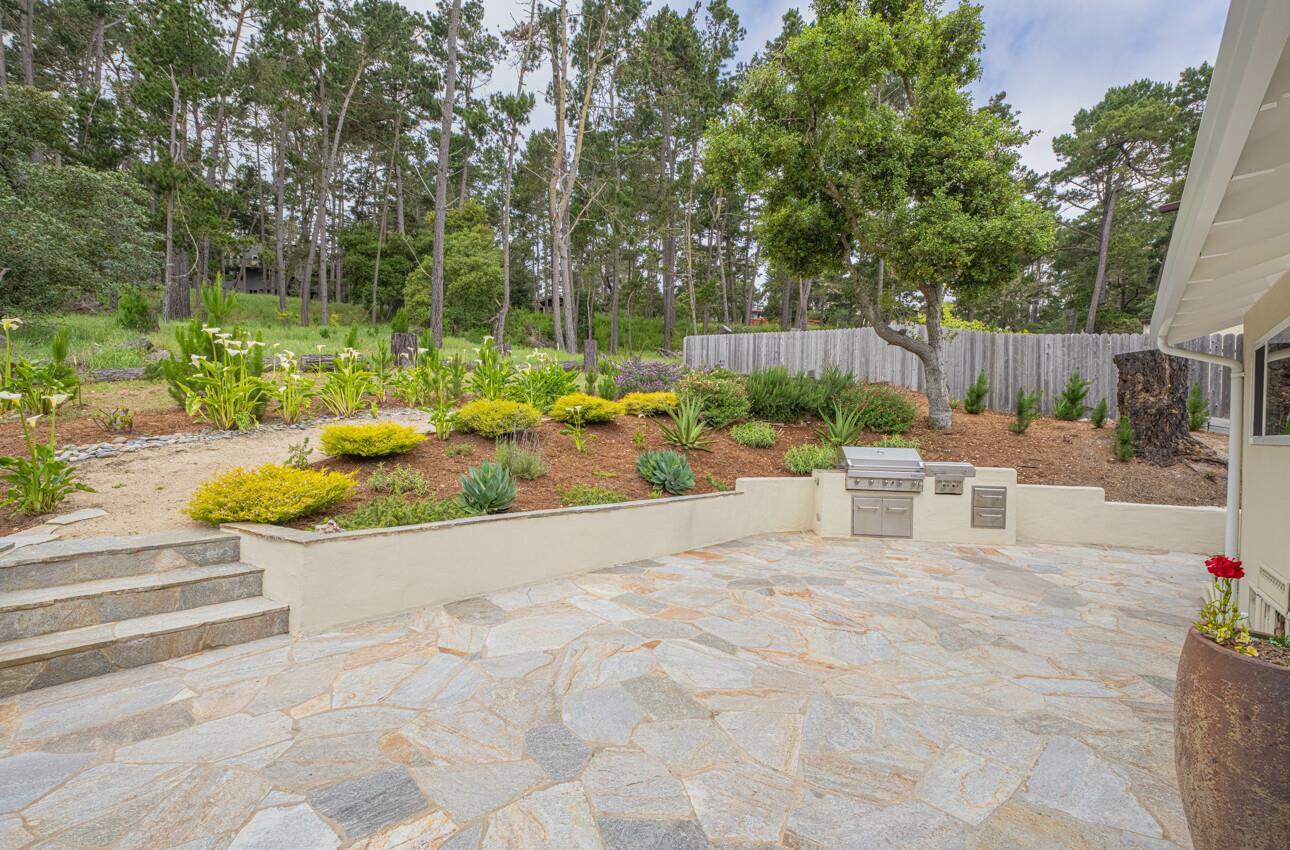24 Pinehill Way Monterey, CA 93940 - Photo 42 of 51 a view of a swimming pool with a patio and wooden fence