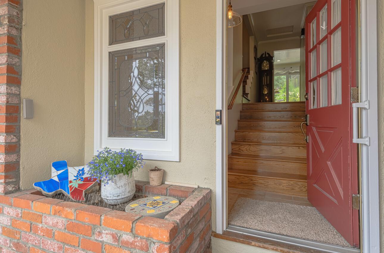 24 Pinehill Way Monterey, CA 93940 - Photo 7 of 51 a room with painting on the wall and a window