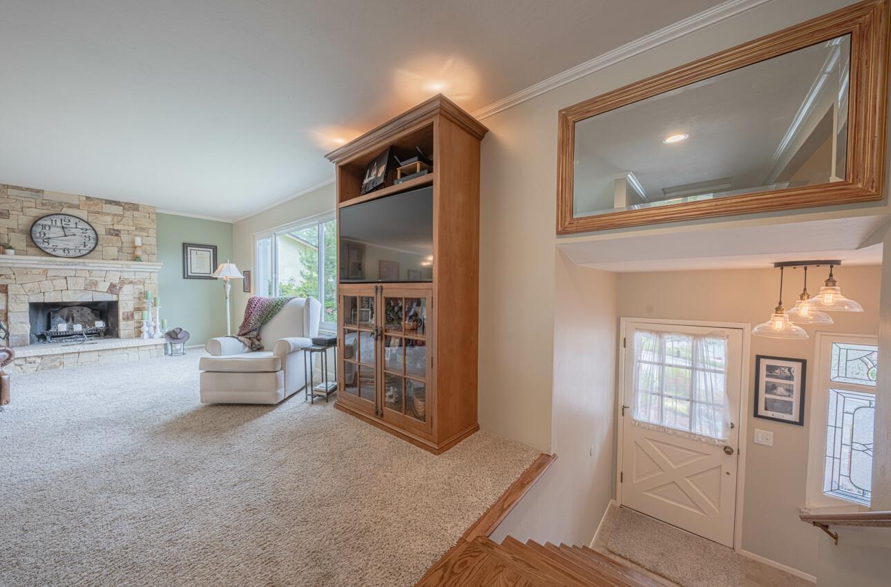 24 Pinehill Way Monterey, CA 93940 - Photo 8 of 51 a living room with furniture and a fireplace