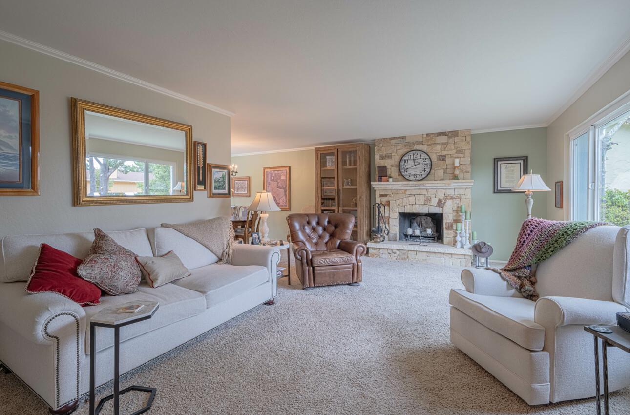 24 Pinehill Way Monterey, CA 93940 - Photo 9 of 51 a living room with furniture and a fireplace