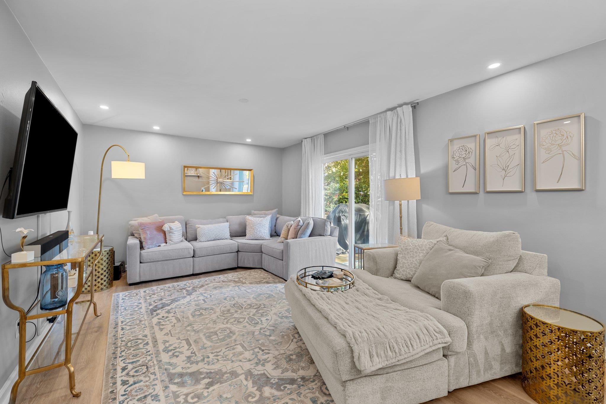 3604 Morningside Drive Raleigh, NC 27607 - Photo 17 of 38 a living room with furniture and a flat screen tv