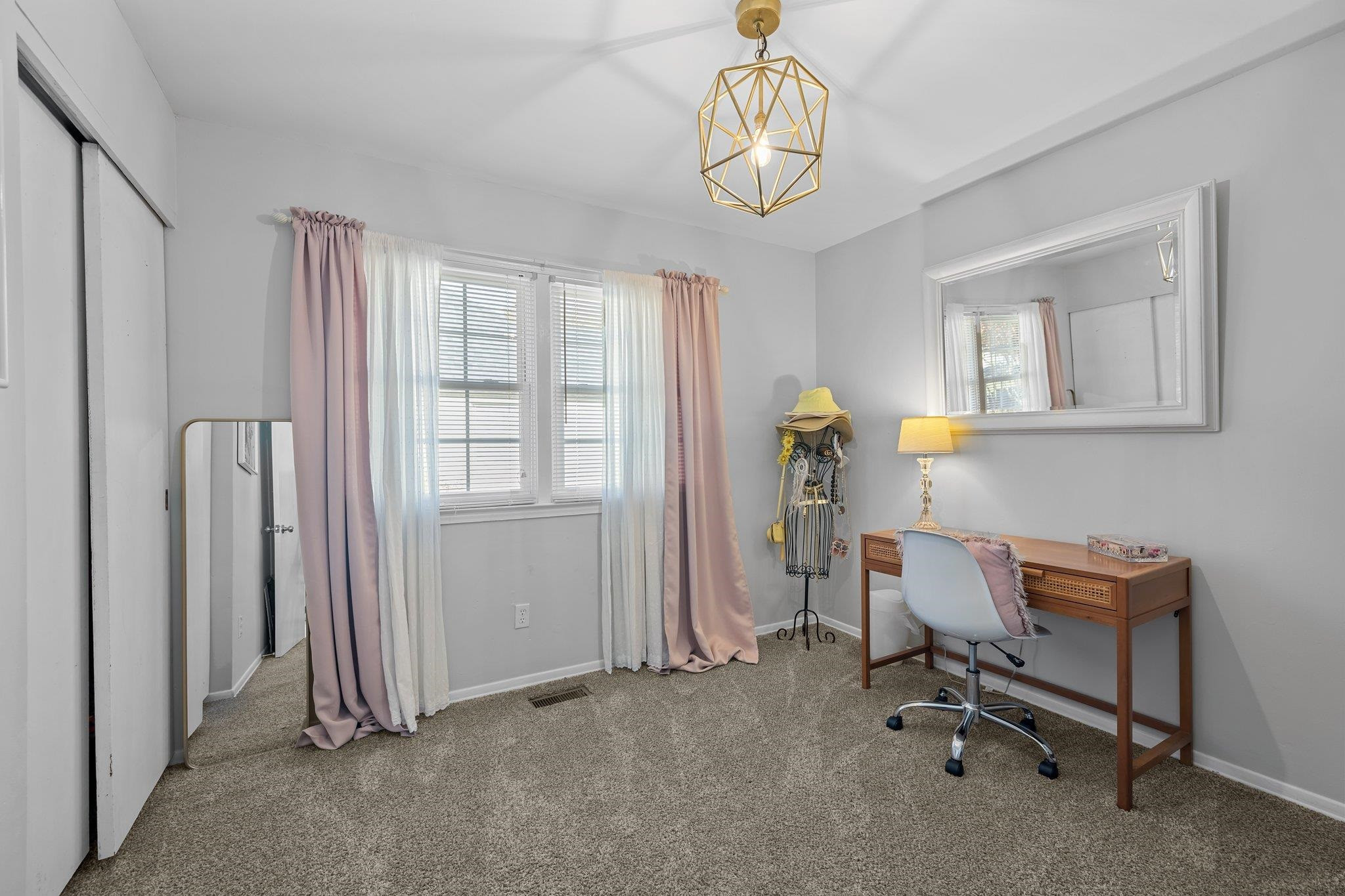 3604 Morningside Drive Raleigh, NC 27607 - Photo 25 of 38 a view of a room with gym equipment