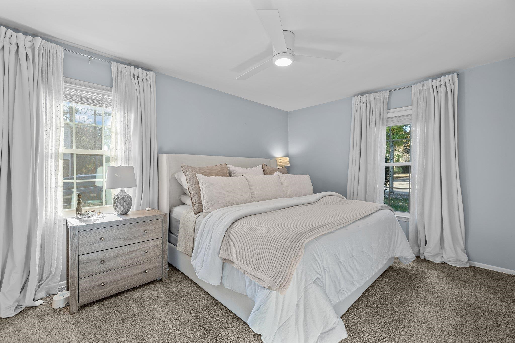 3604 Morningside Drive Raleigh, NC 27607 - Photo 29 of 38 a bedroom with a bed and a window