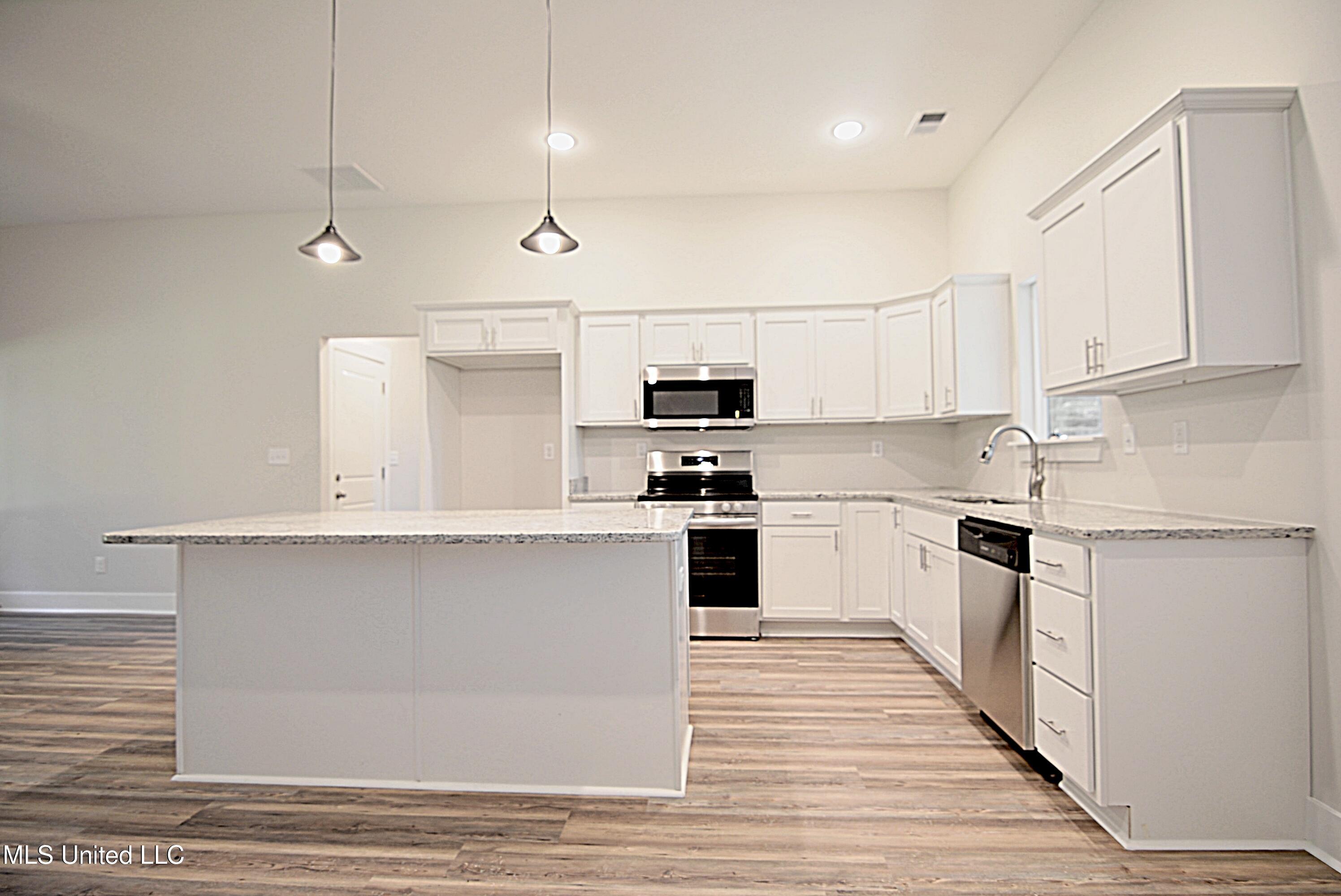 350 Tribble Road Holly Springs, MS 38635 - Photo 5 of 25 Kitchen from Dining Area