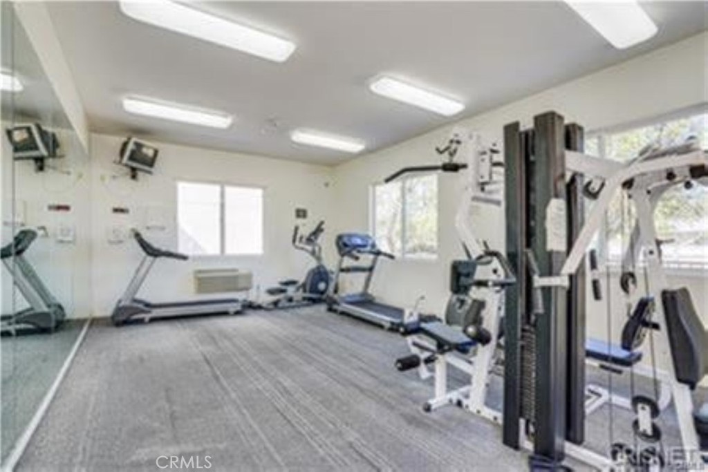 9610 Zelzah Avenue, Unit 310 Northridge, CA 91325 - Photo 21 of 32 a view of a room with gym equipment
