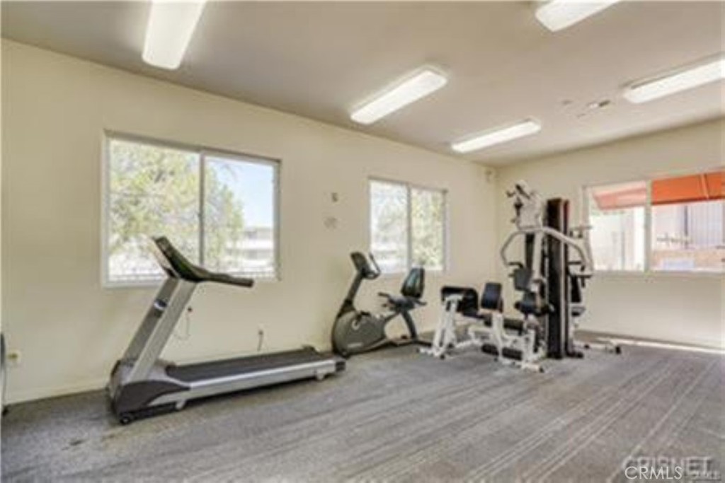 9610 Zelzah Avenue, Unit 310 Northridge, CA 91325 - Photo 22 of 32 a view of a room with gym equipment