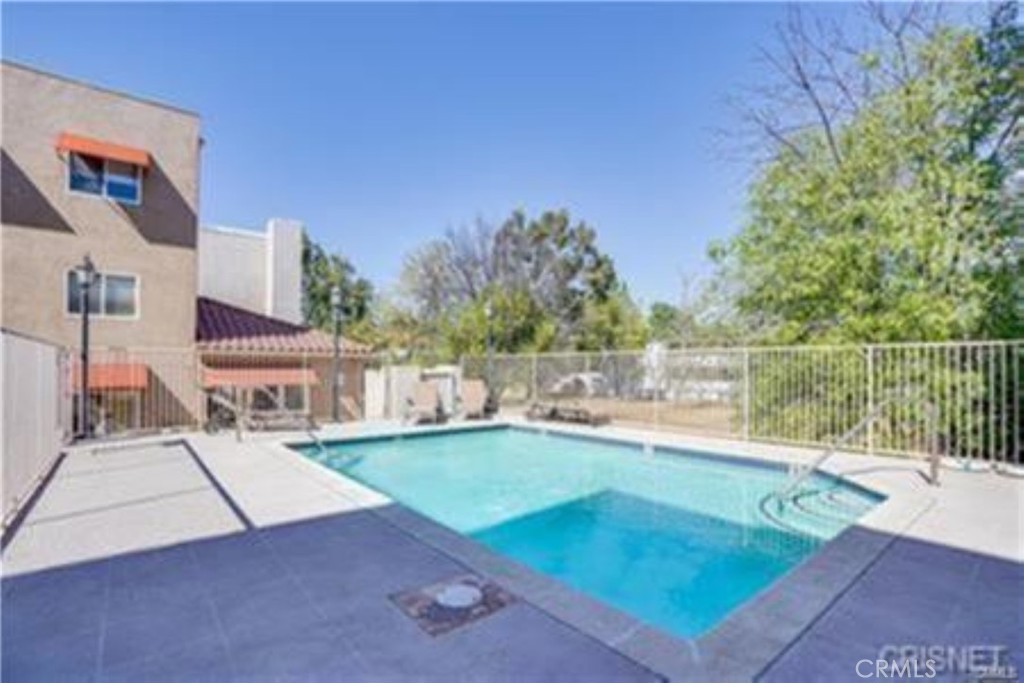 9610 Zelzah Avenue, Unit 310 Northridge, CA 91325 - Photo 24 of 32 swimming pool view with a outdoor space