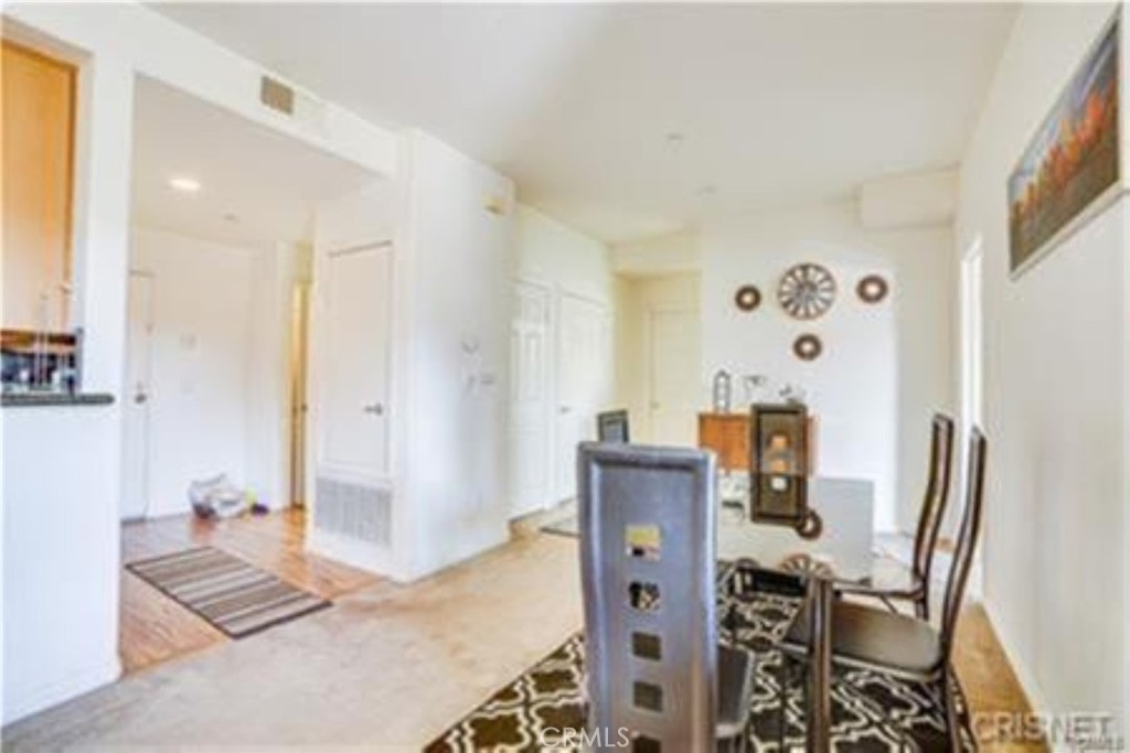9610 Zelzah Avenue, Unit 310 Northridge, CA 91325 - Photo 4 of 32 a view of a livingroom with furniture