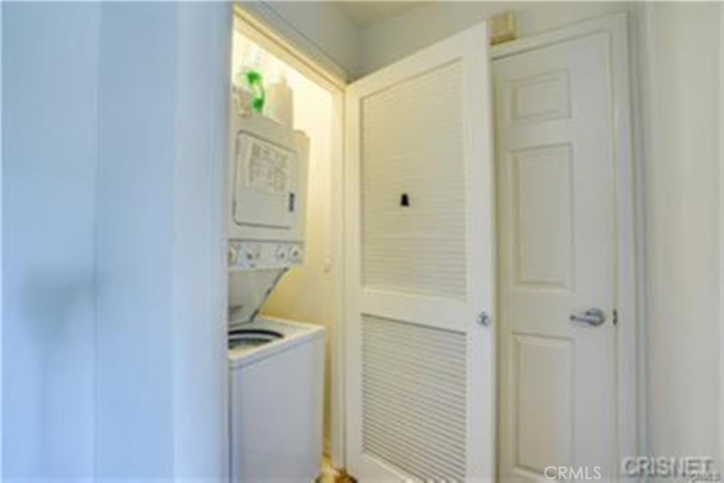 9610 Zelzah Avenue, Unit 310 Northridge, CA 91325 - Photo 6 of 32 a bathroom with a sink a toilet and shower