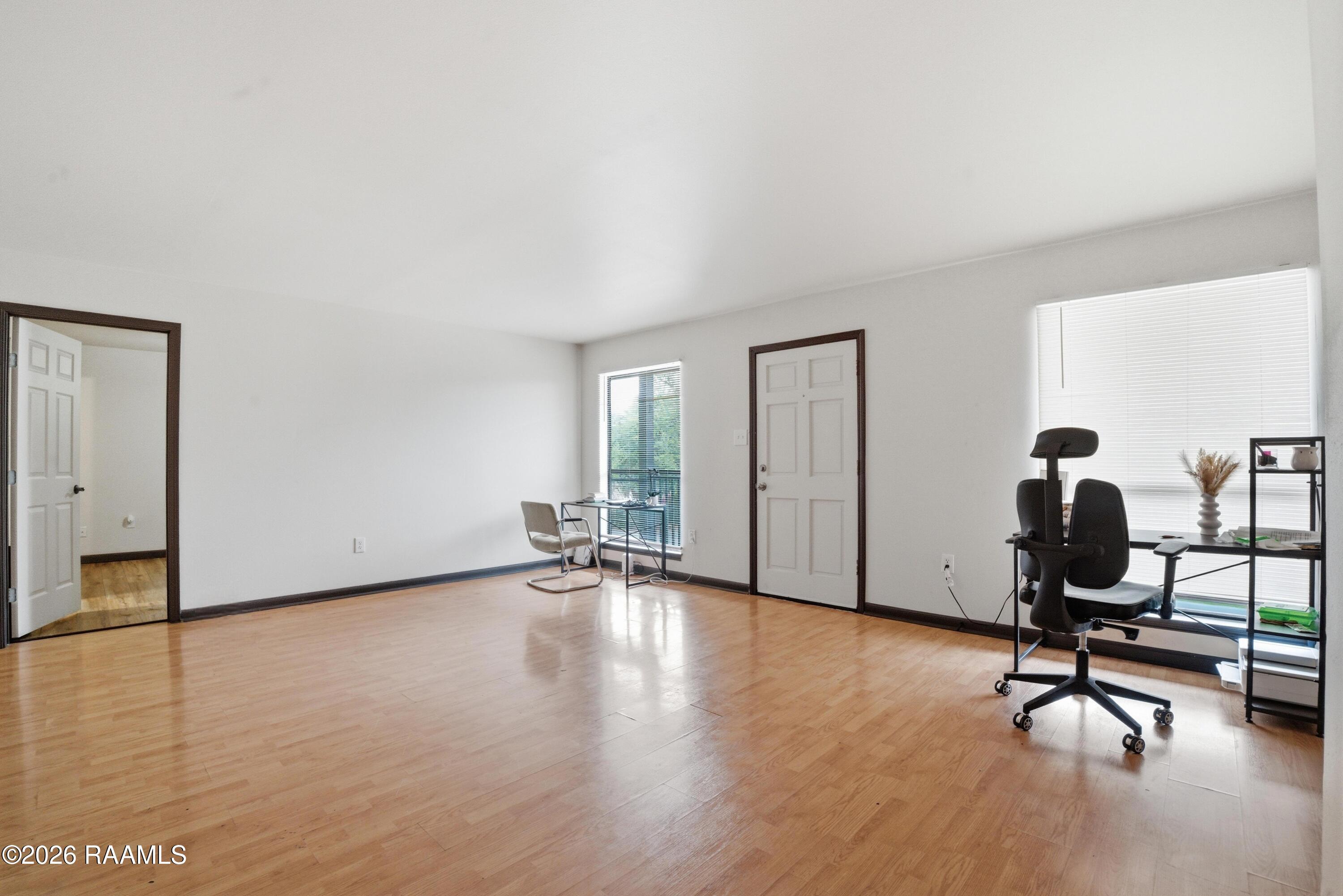701 South College Road, Unit 307 Lafayette, LA 70503 - Photo 4 of 12 Living Room from Bedroom View
