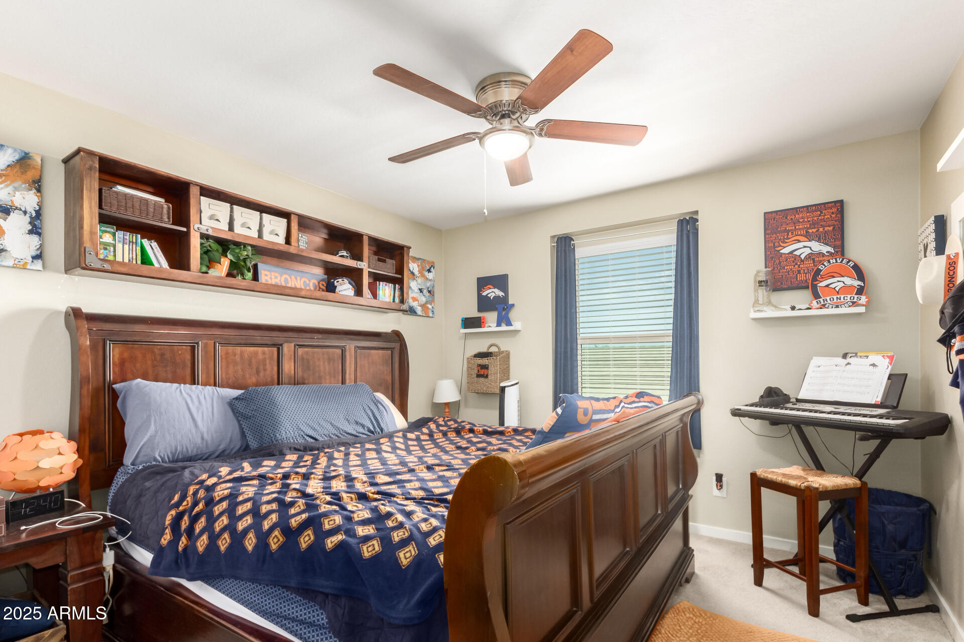 40098 West Ganly Way Maricopa, AZ 85138 - Photo 33 of 46 a bedroom with furniture and a window