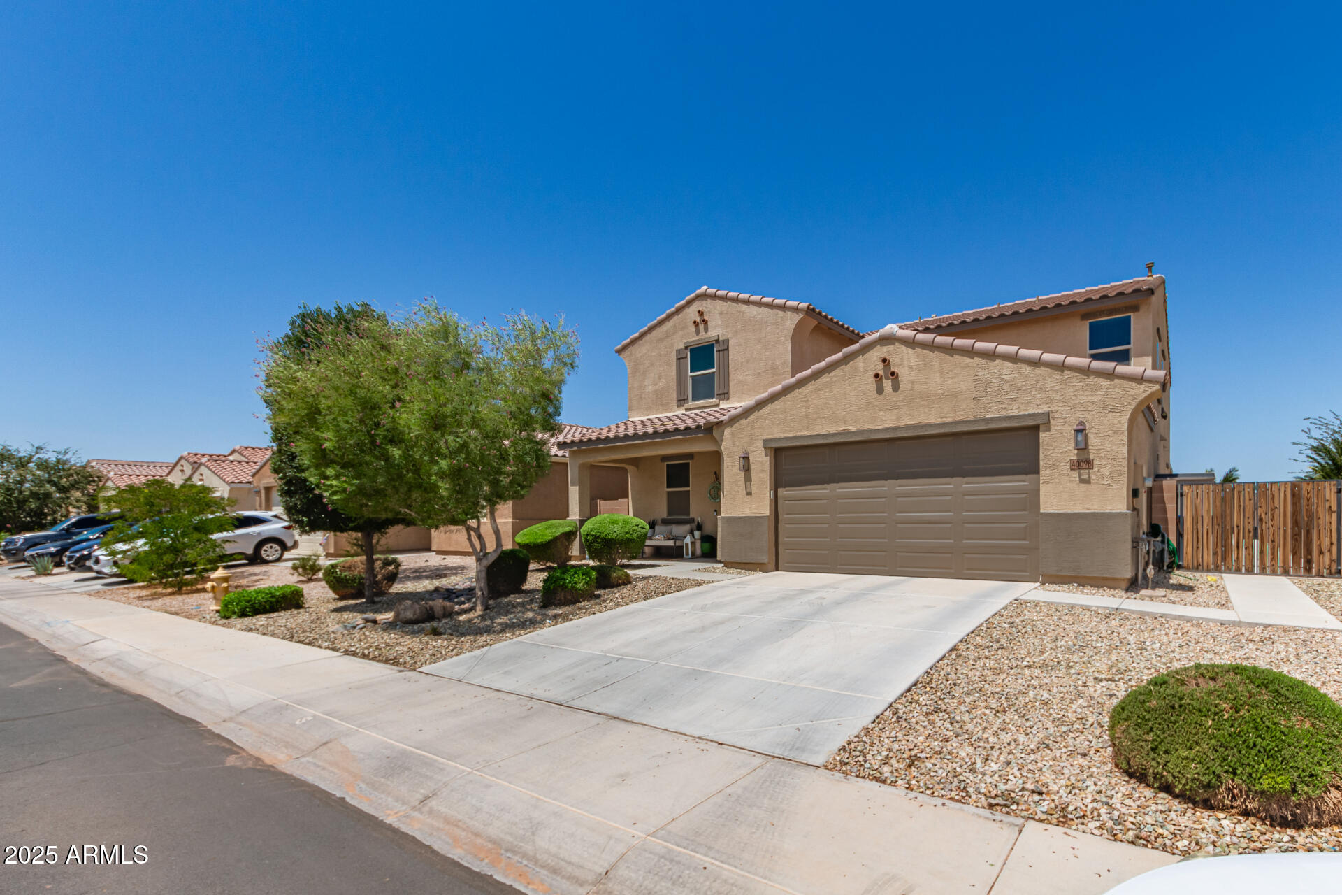 40098 West Ganly Way Maricopa, AZ 85138 - Photo 6 of 46 a front view of a house with sitting area