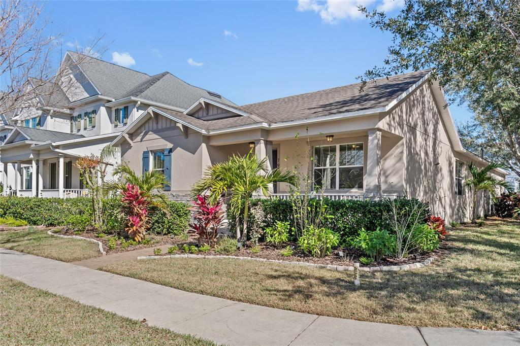 front view of a house with a yard