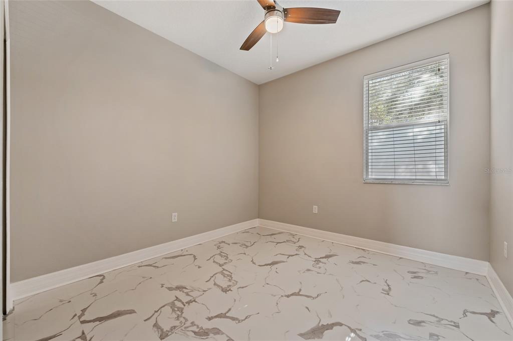 7935 Winter Wren Street Winter Garden, FL 34787 - Photo 24 of 36 a view of empty room with window