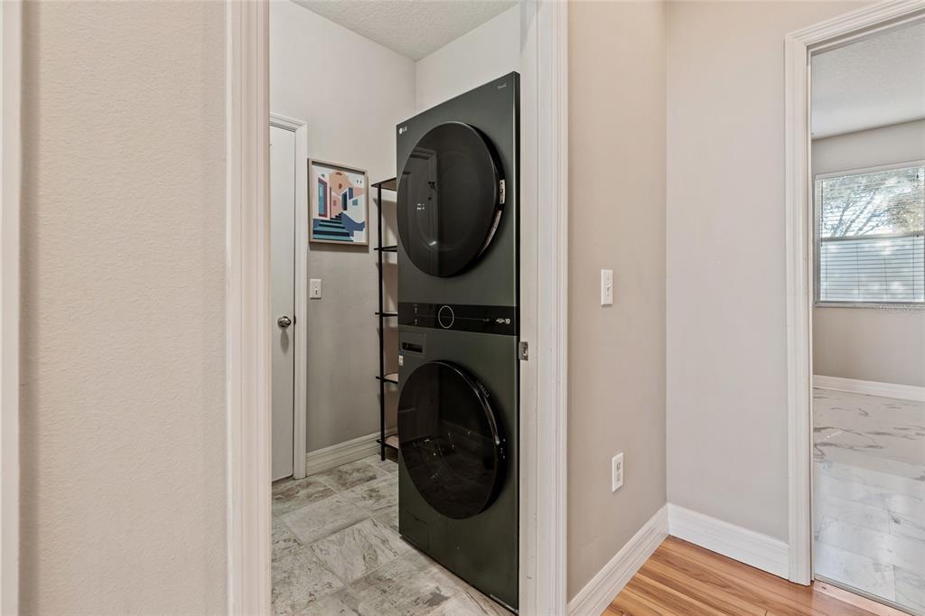 7935 Winter Wren Street Winter Garden, FL 34787 - Photo 25 of 36 a close view of a utility room with washer and dryer