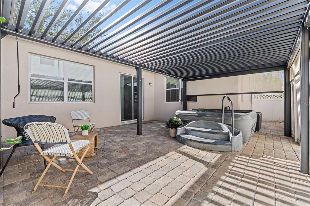 7935 Winter Wren Street Winter Garden, FL 34787 - Photo 27 of 36 a balcony with chairs and table