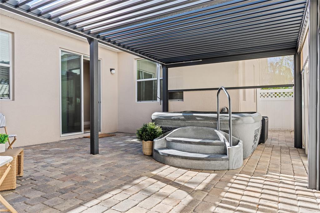 7935 Winter Wren Street Winter Garden, FL 34787 - Photo 28 of 36 a view of a porch with furniture