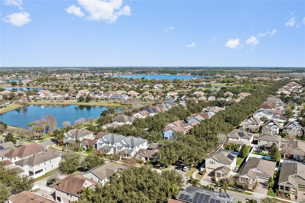 7935 Winter Wren Street Winter Garden, FL 34787 - Photo 35 of 36 an aerial view of a city with ocean view in back