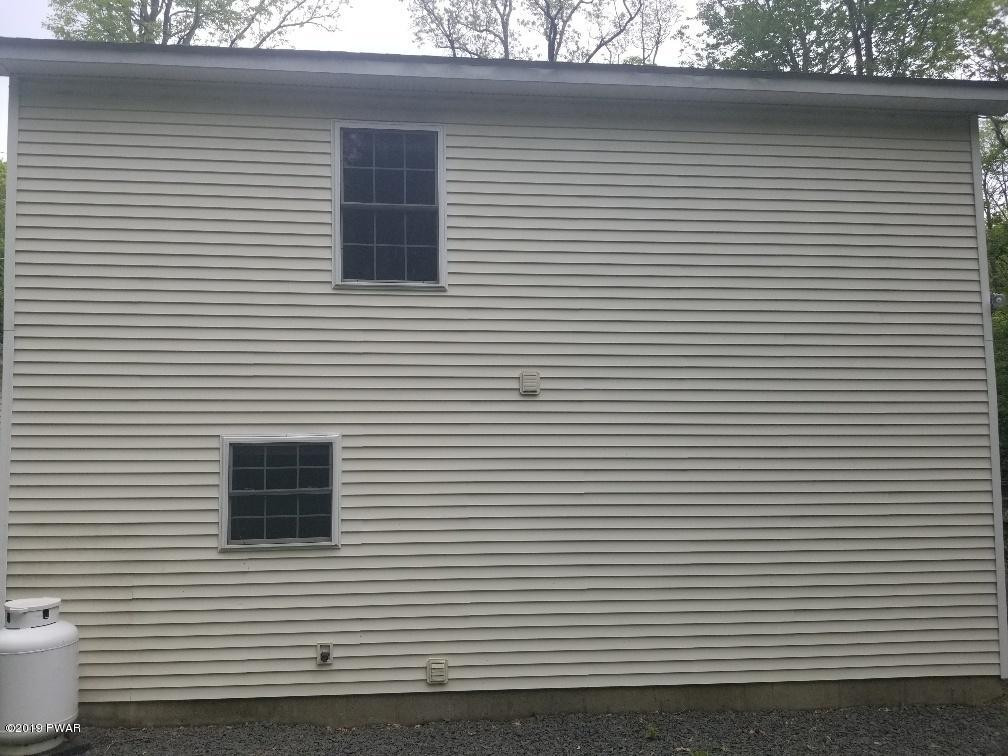116 Walnut Road Milford, PA 18337 - Photo 1 of 22 a view of a white building