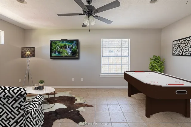 a living room with a couch and a table