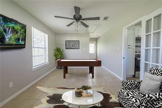 a room with furniture and a window