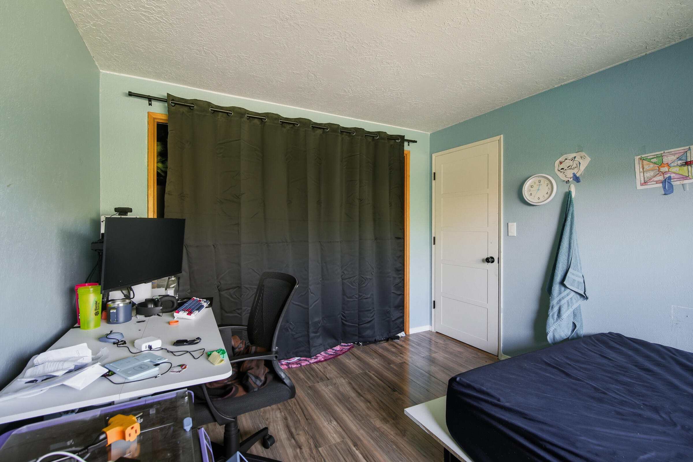 664 Southwest 35th Street Redmond, OR 97756 - Photo 14 of 19 a bedroom with a bed and furniture